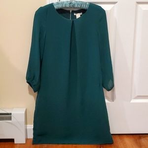 H&M Green color top with a zip on it's back